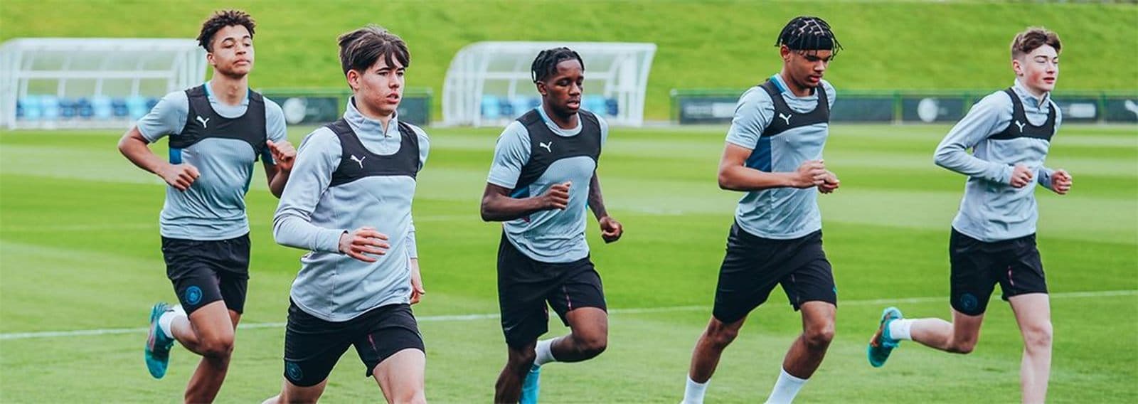 Academy players running drills