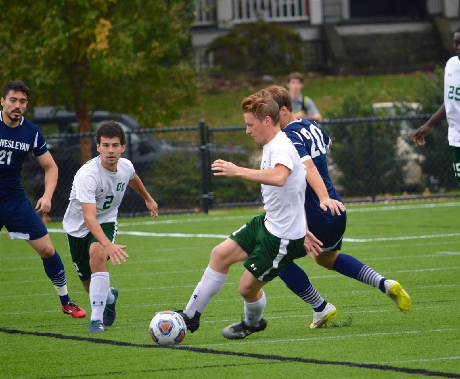 Midfield battle during an evening match