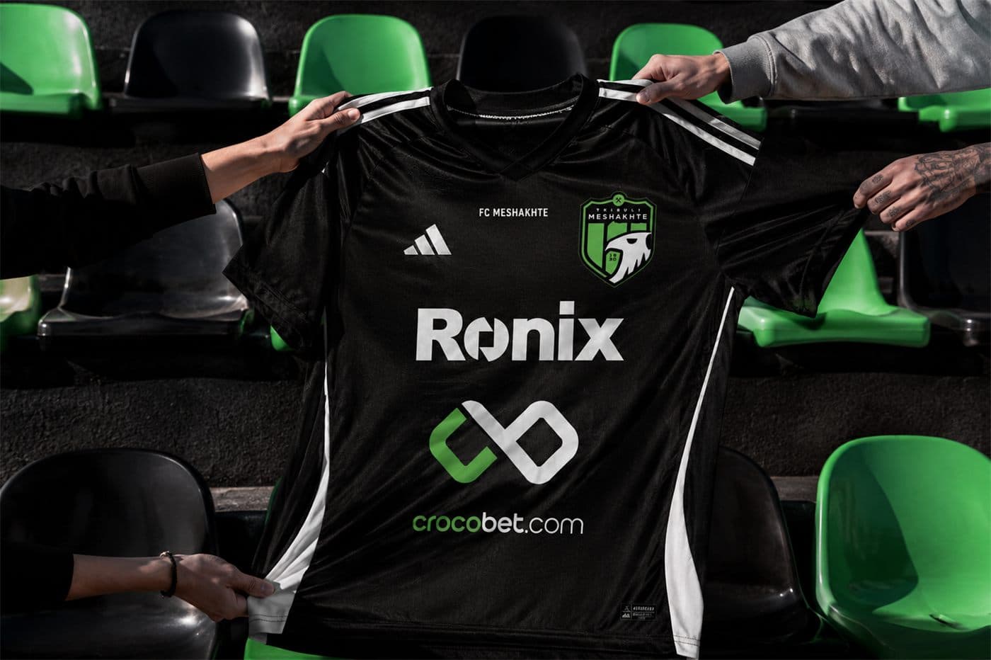 Meshakhte home jersey held up in the stands